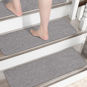 Non-slip stair treads with TPE backing, measuring 22 x 70 cm. Machine washable, self-adhesive pads are made of 100% polyester