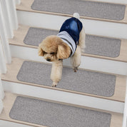 Non-slip stair treads with TPE backing, measuring 22 x 70 cm. Machine washable, self-adhesive pads are made of 100% polyester
