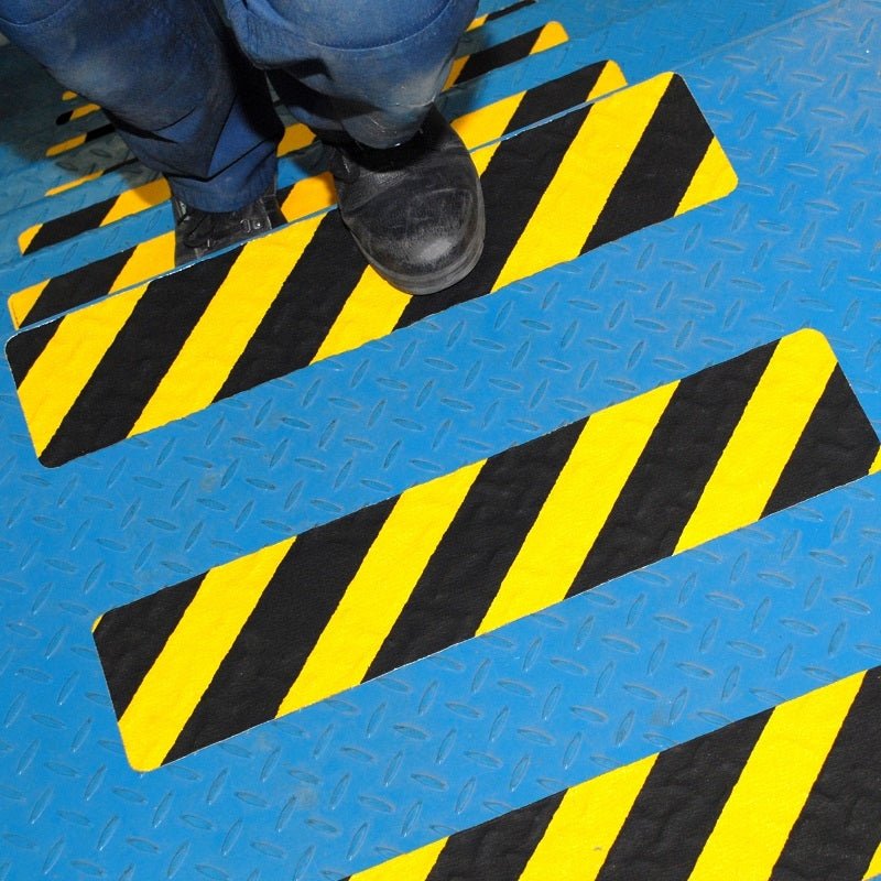 Anti-Slip Pre Cut anti slip non skid tape on metal stairs and steps - Slips Away