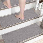 Non-slip stair treads with TPE backing, measuring 22 x 70 cm. Machine washable, self-adhesive pads are made of 100% polyester 