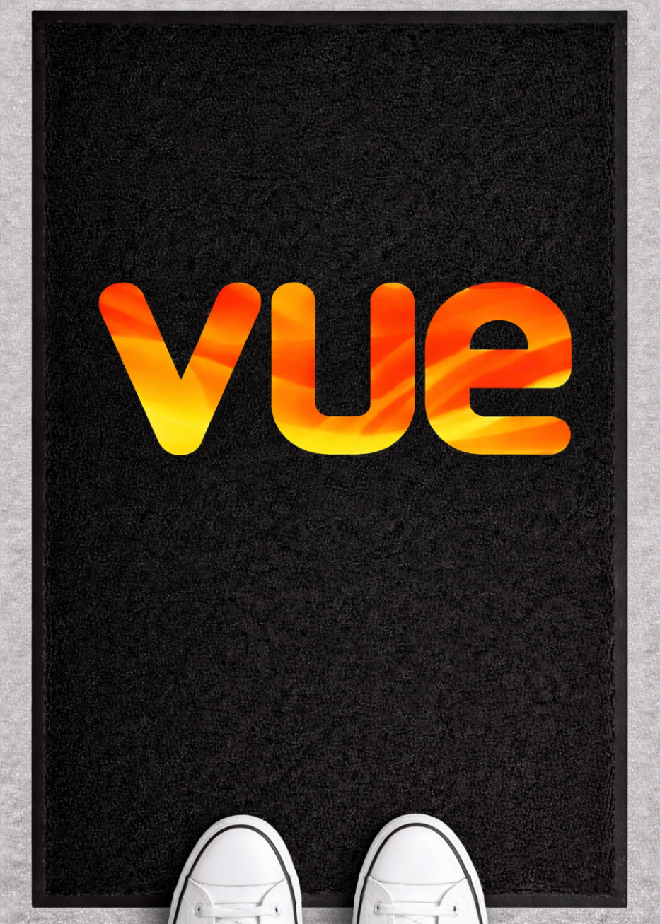 Vue_logo_on_heavy_duty_black_mat_with_sneakers.png