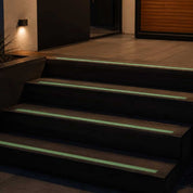 Luminescent Green GRP decking strips fitted on outdoor stairs