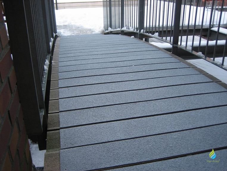 UK-made GRP decking strips fitted to decking
