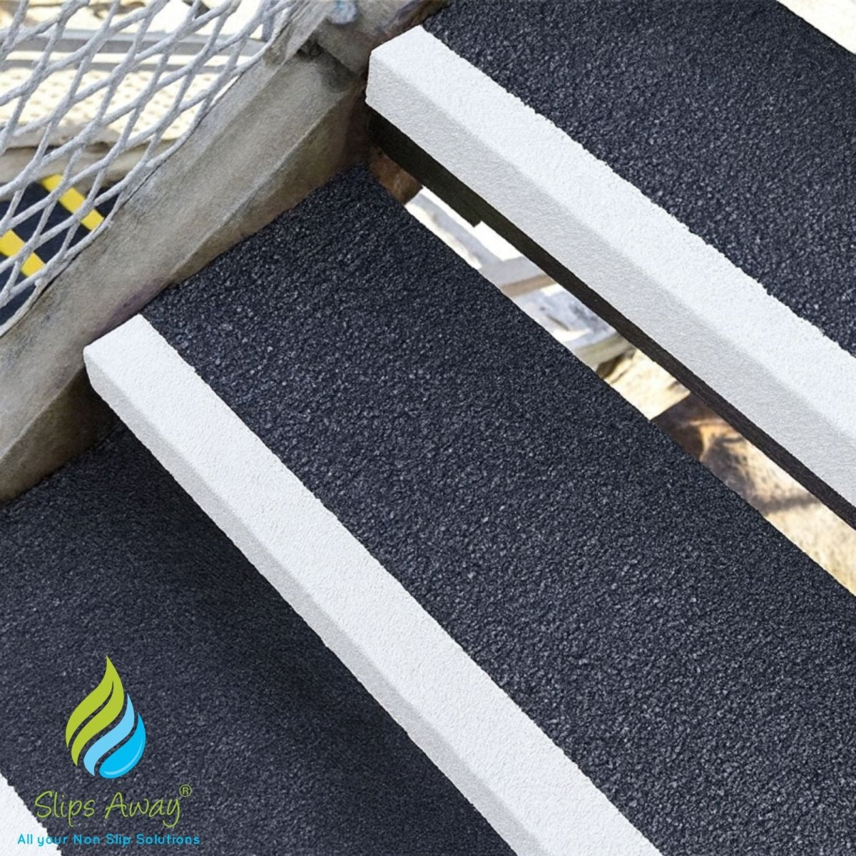 Black anti-slip mat with a white border on a wooden deck, featuring the 'Slips Away' brand logo.