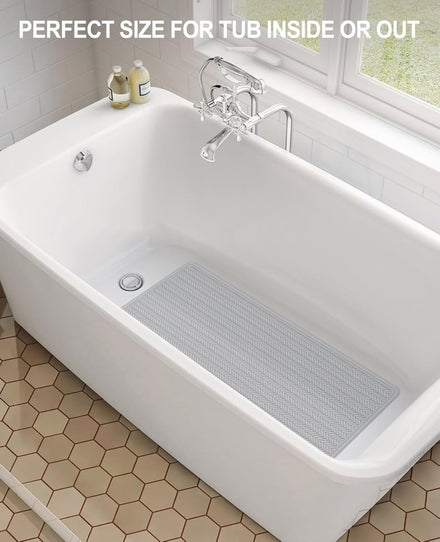 Non-slip rubber bath mat for inside bath, 43x92 cm, machine washable with strong suction cups.