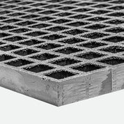 Close up of Grey GRP mesh grating with diamond pattern on a white background