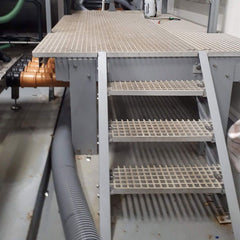 GRP staircase with multiple steps in an industrial setting